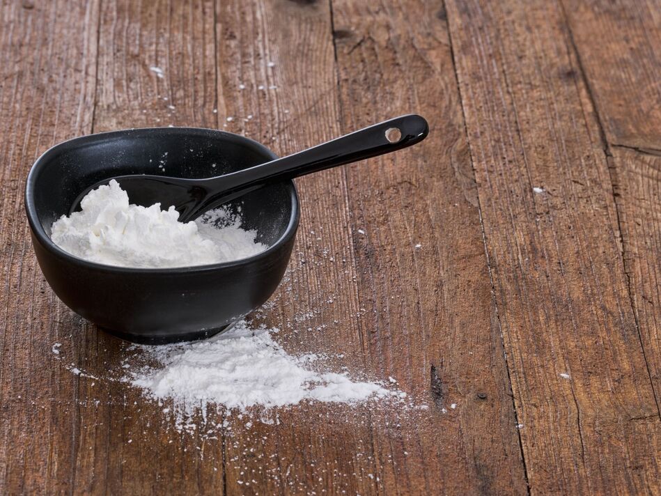 Farine de maïs dans un bol, utilisée pour épaissir les sauces, etc. Farine de maïs dans un bol, utilisée pour épaissir les sauces, etc.